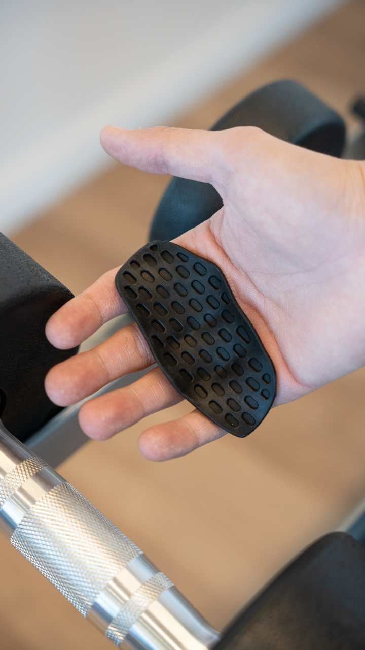 grip negro para no lastimarse las manos en el gimnasio